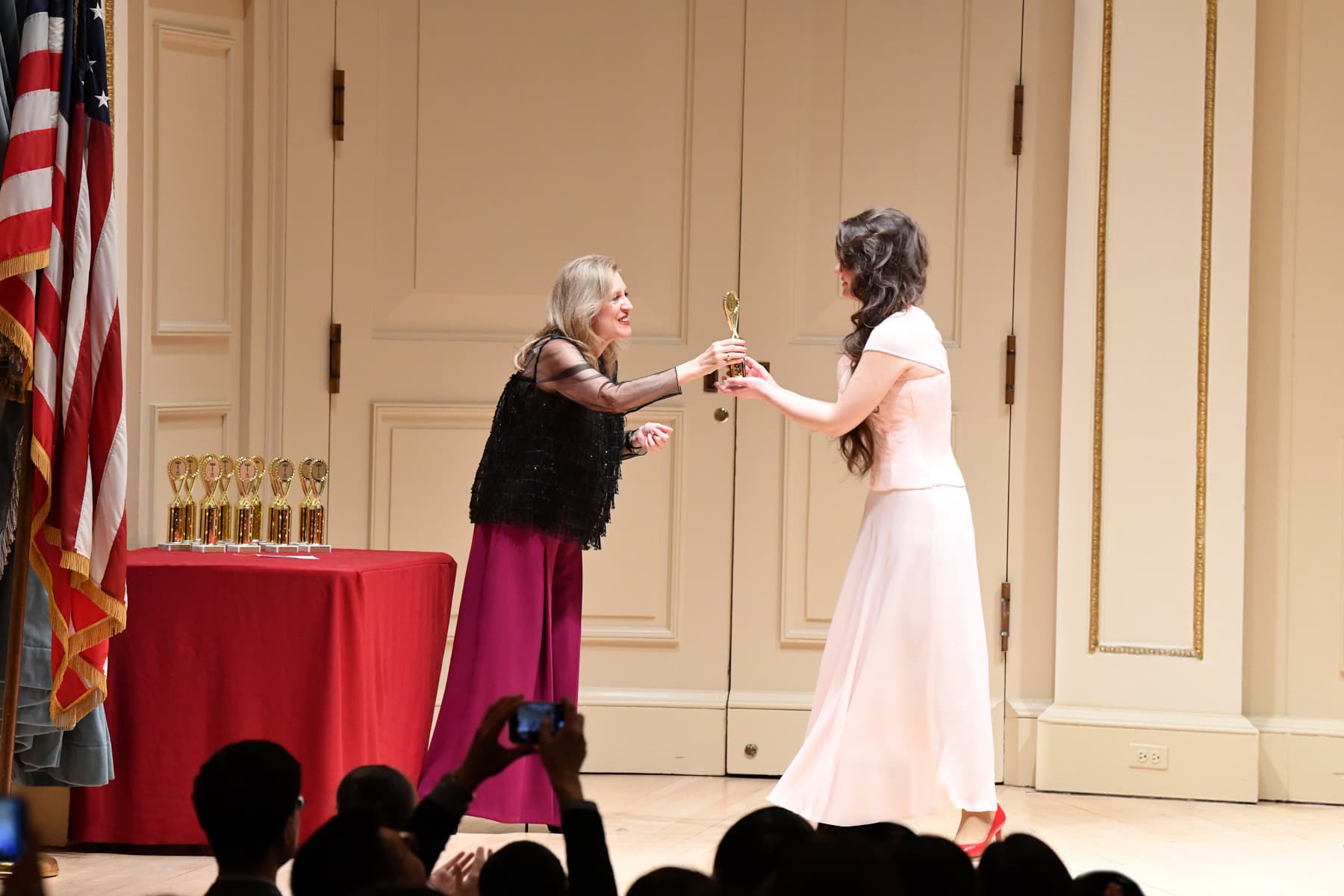 GLORIALLE receiving an award at Carnegie Hall